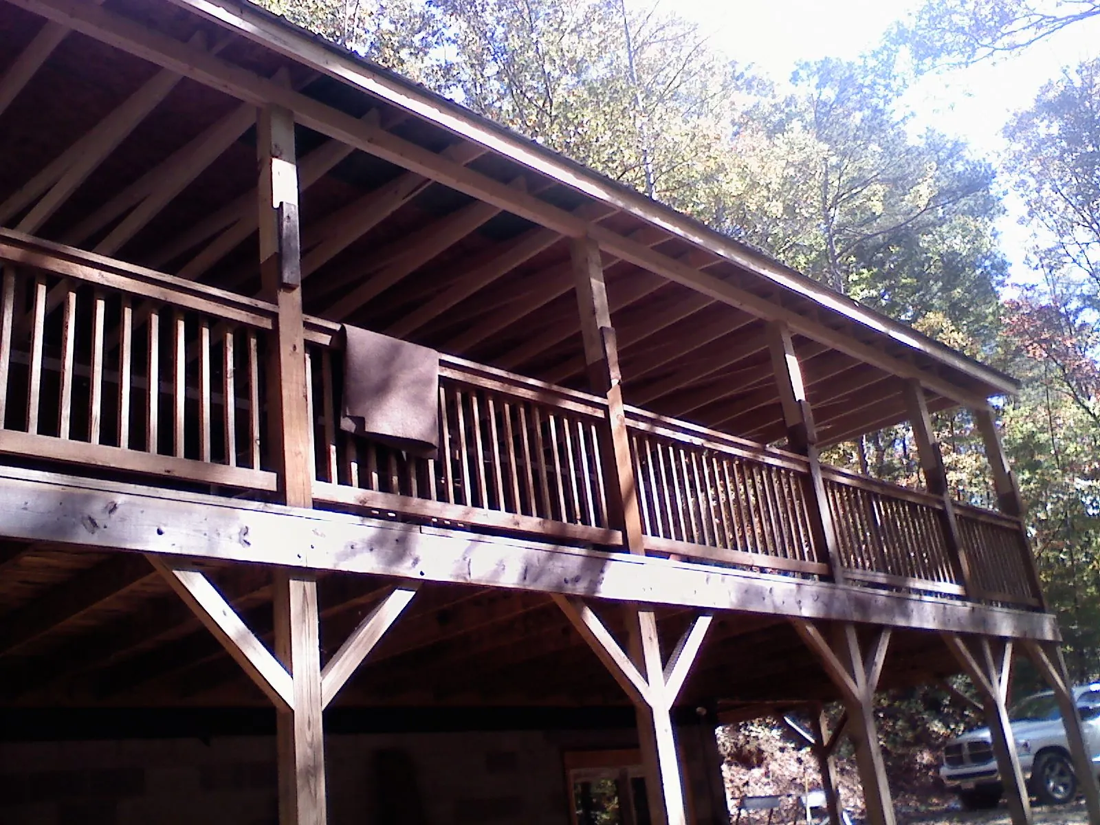 Timber framing under a new elevated porch and deck — Roof Leak Repair in Lincolnshire by Roofing Brothers